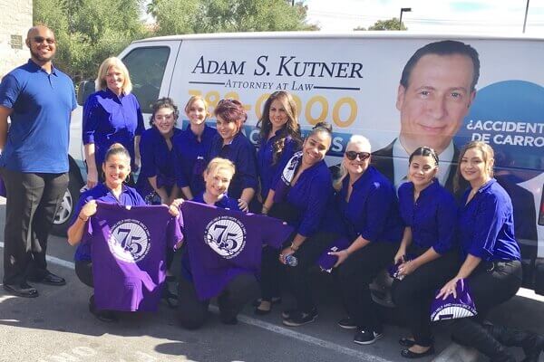 Adam Kutner Team Visits Catholic Charities 